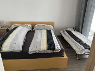 Bedroom with folding bed
