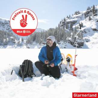 Logo of the Blick Winter Awards with someonesitting in the snow on the mettmen lake with a ice drill and snow shoes in the background and red font and the Logo and which category they are in.