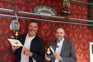 Pascal Zuberbühler and Martin Nydegger with the newly opened egg-gondola express at the Märchenhotel Braunwald