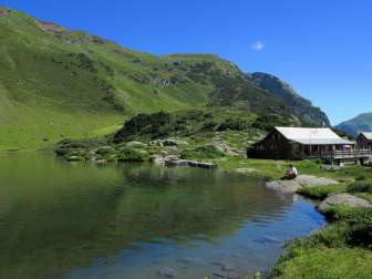 Upper Murgsee with mountain inn.